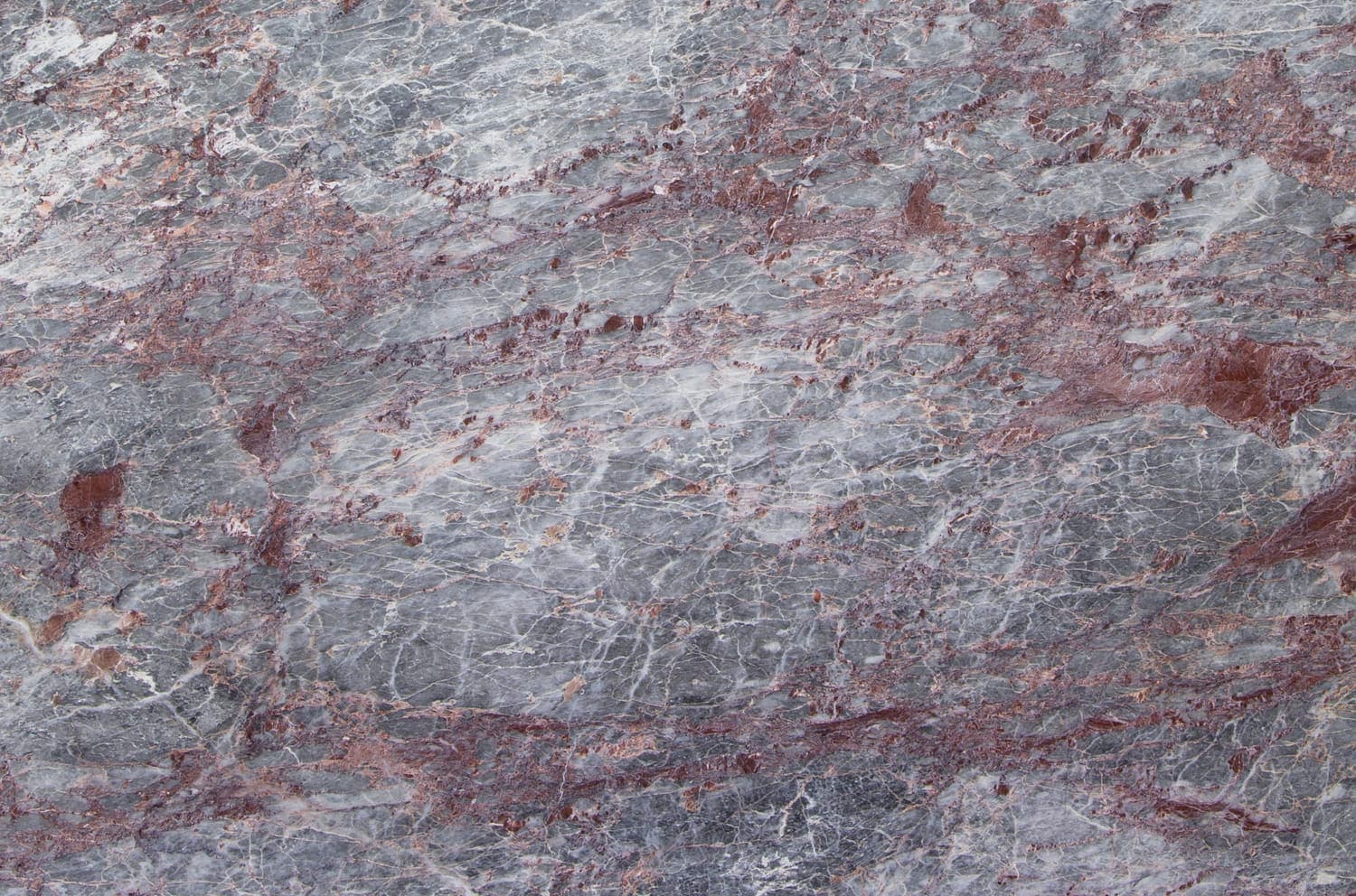 Salome marble with cool grey and red mineral movement